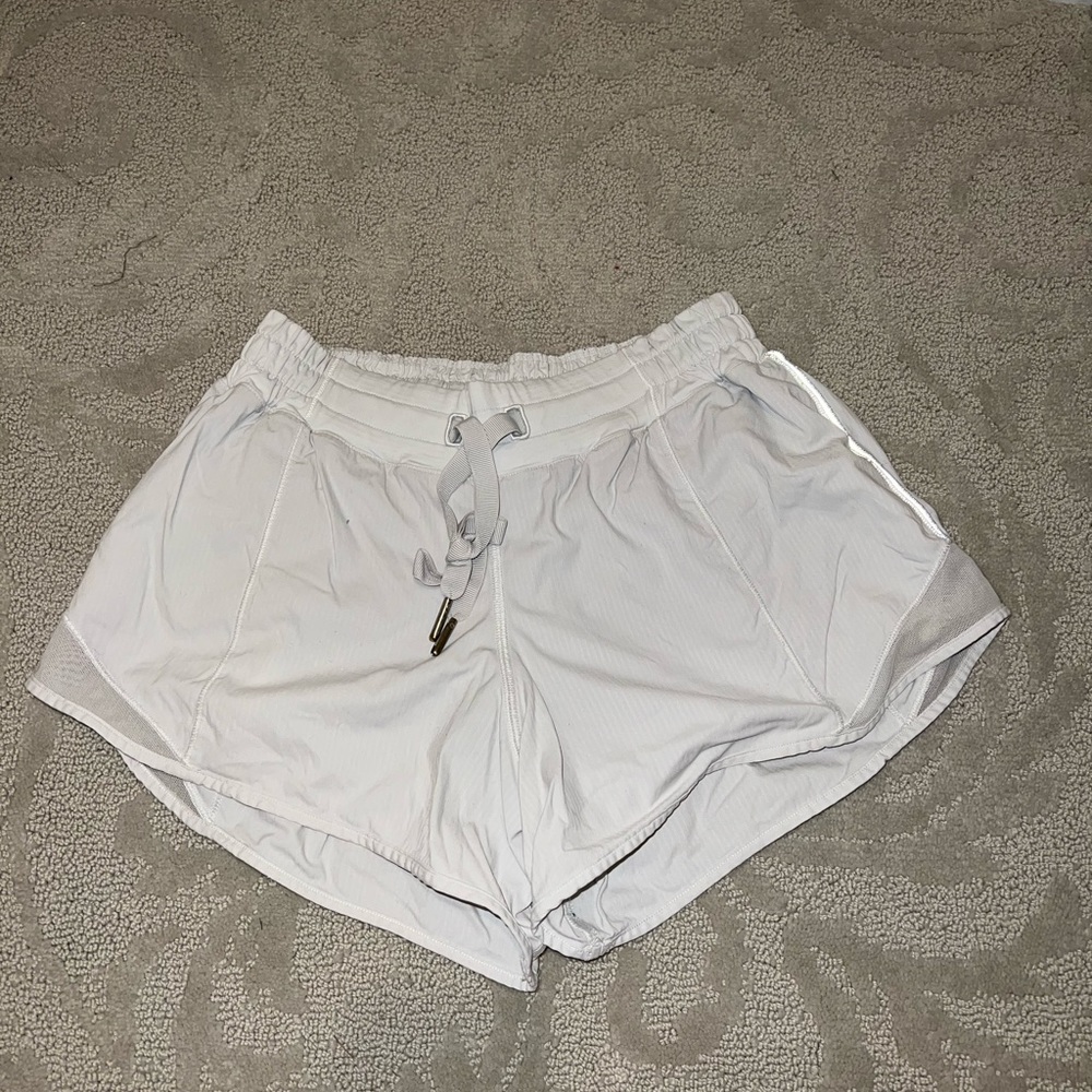 Lululemon white athletic shorts; size 4
